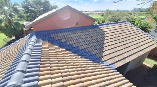 Freshly sealed and re-tiled roof by Perfect Peaks